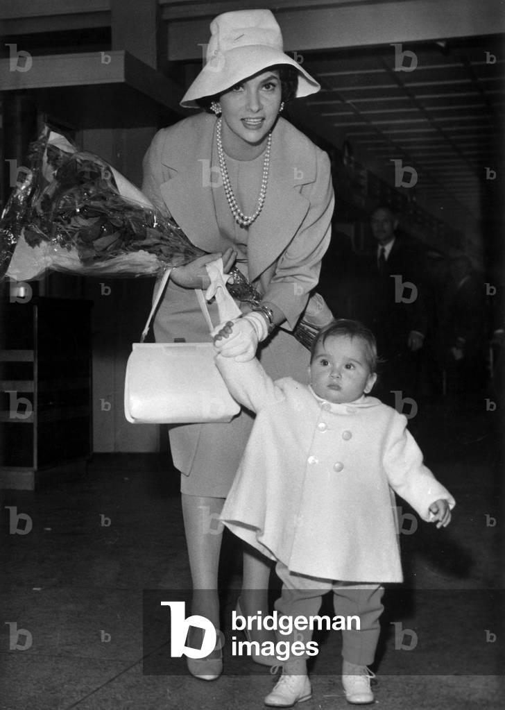 The Italian Actress Gina Lollobrigida at The Orly Airport To Take The Plain To Rome September 23, 1958 (b/w photo)