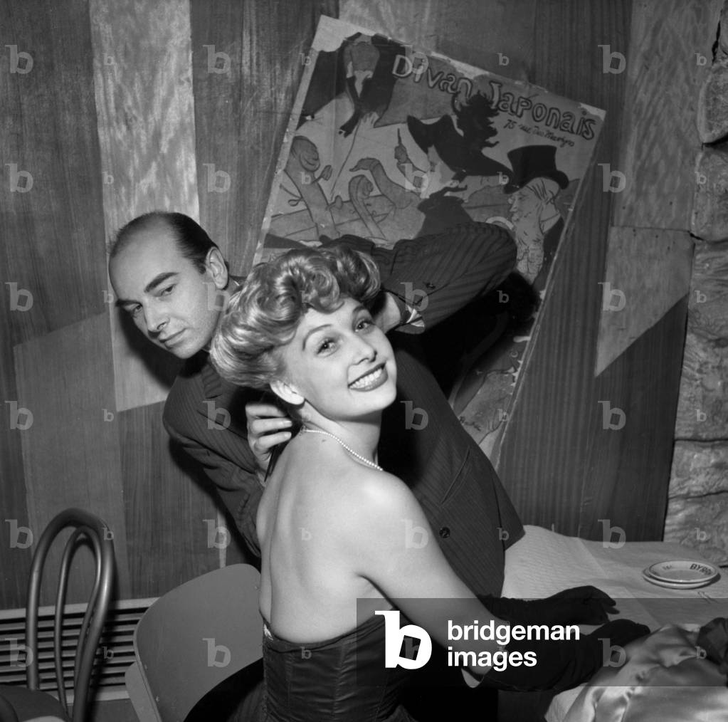 Night in Tribute To Toulouselautrec on October 3, 1952 at Le Divan Japonais in Paris : French Actress Arlette Poirier With The Belle Epoque Hairstyle (b/w photo)