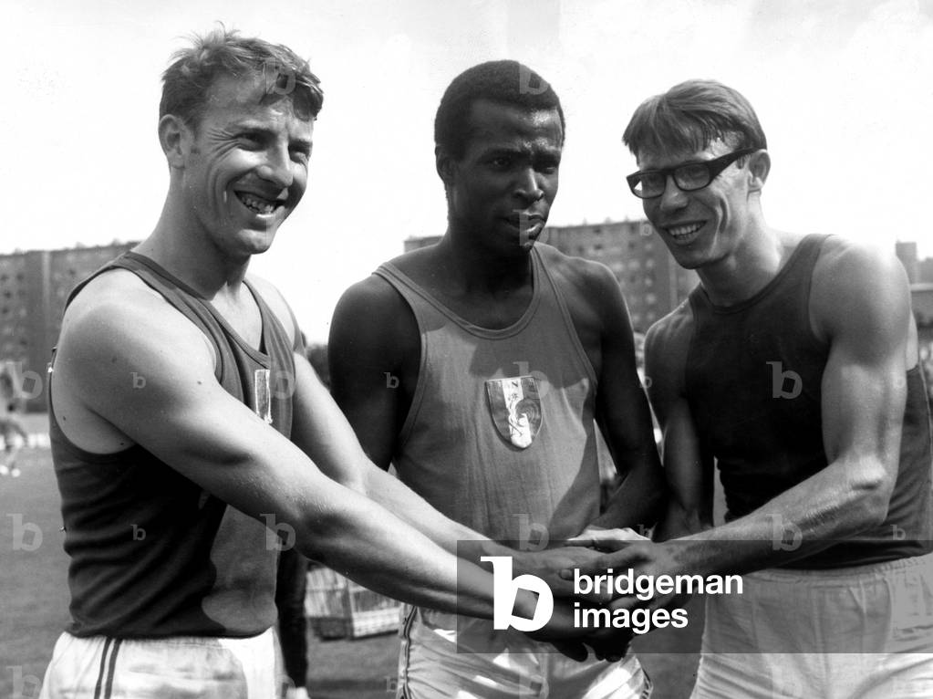 3 Sprinters Marc Berger, Roger Bambuck (Winner) and Nikolay Ivanov After A 100M in Colombes, France, June 24, 1967 (b/w photo)