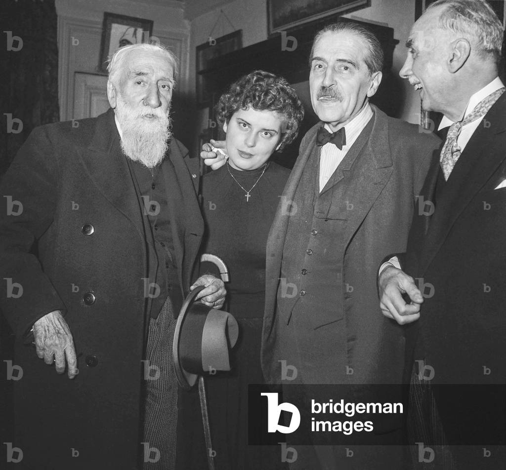 French writer Jean Louis Vaudoyer (2nd from r) after his election at the Academie Francaise, congratulated by friends and his daughter Daphne, at home, January 12, 1950 (b:w photo)