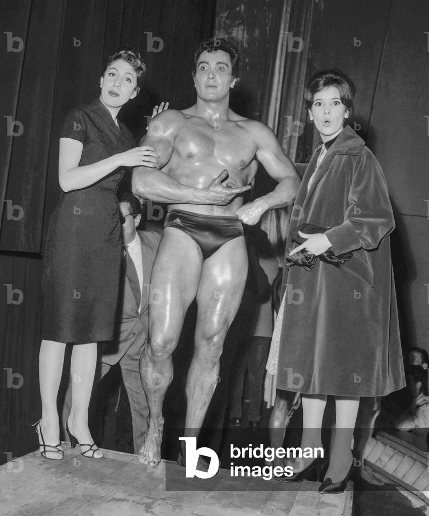 Election of the most beautiful French Heracles, Paris, April 8, 1959 : the winner Yvan Larvor surrounded by Maria Lopez and Marie Jose Nat F3(b/w photo)