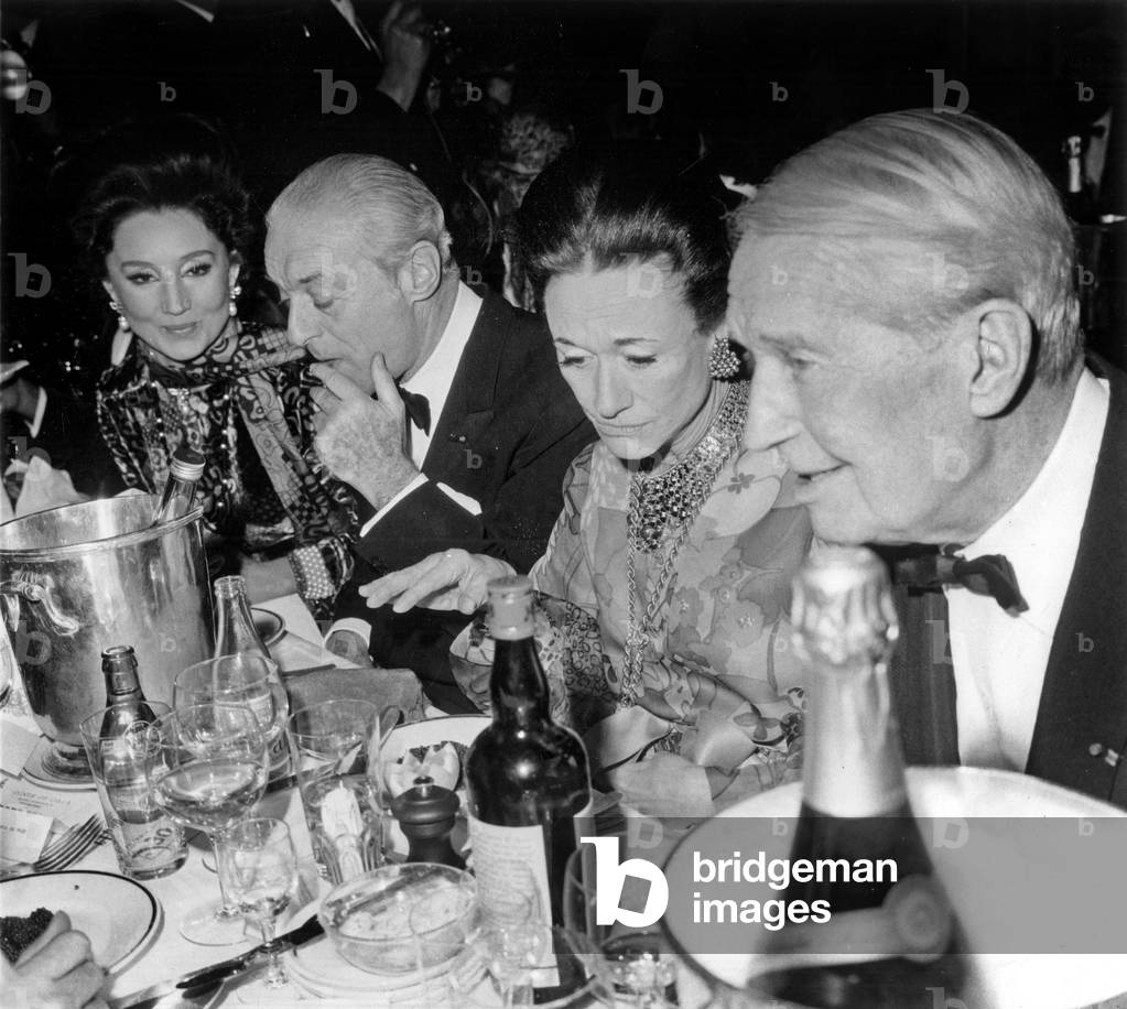 L-R : Viscountess Jacqueline of Ribes, Baron Guy De Rothschild, Duchess of Windsor and Maurice Chevalier at Premiere of Revue 
