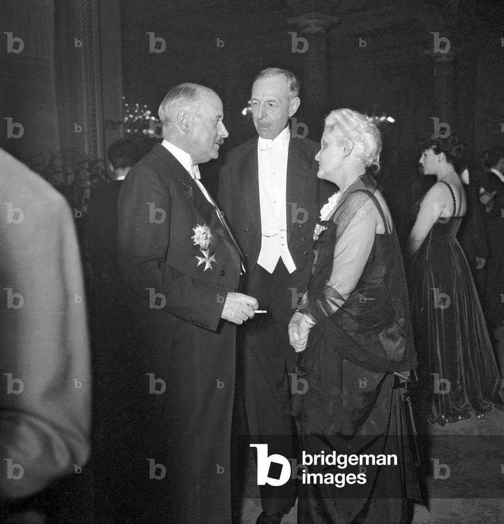 Reception Given at The Elysee, Paris, on February 23, 1949 : Andre Francois Poncet, Eric Labonne, Journalist Genevieve Tabouis (b/w photo)