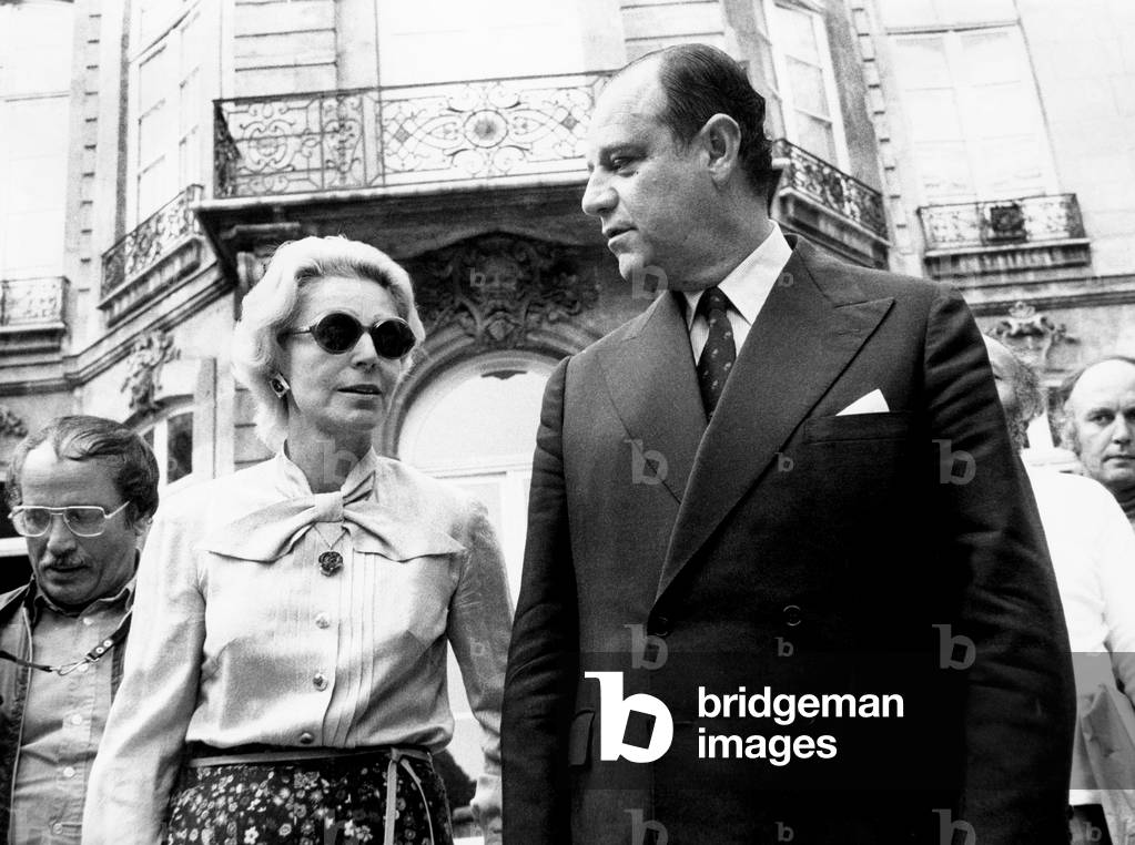 French Prime Minister Raymond Barre With his Wife in Front of Matignon Hotel After his First Press Conference August 30, 1976 (b/w photo)
