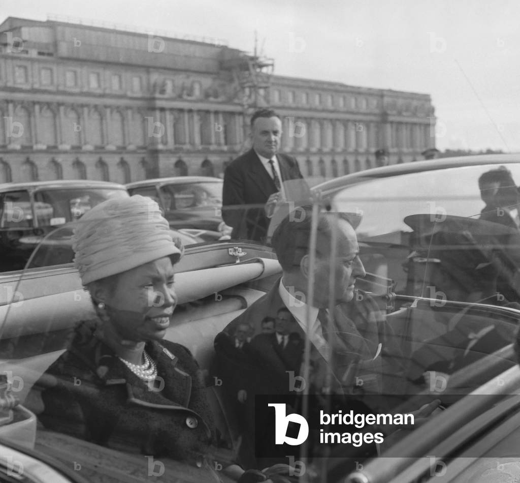 Mrs Tsiranana (wife of Malagasy president) and French minister of culture Andre Malraux visiting the castle of Versailles, October 27, 1960 (b/w photo)