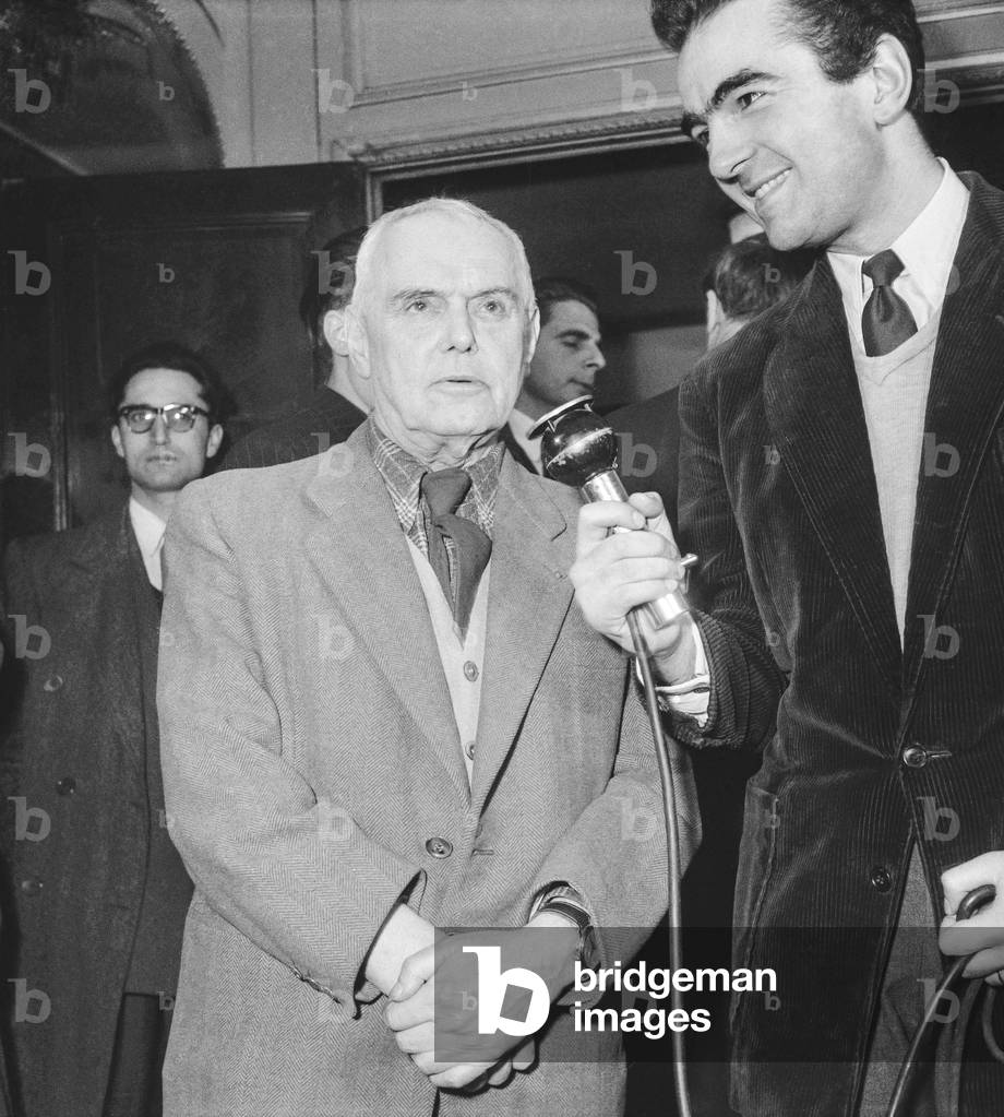 French writer Pierre Mac Orlan (Academie Goncourt) anouncing election of writer Raymond Queneau as a new member of the Academie Goncourt, Paris, March 12, 1951 (b/w photo)