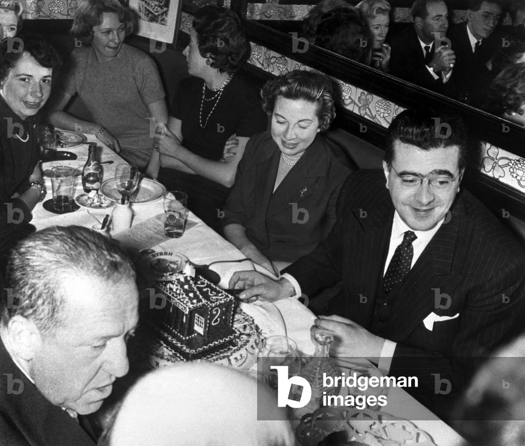 French Politician Felix Gaillard With his Wife (L) Blowing Candles on Cake (b/w photo)