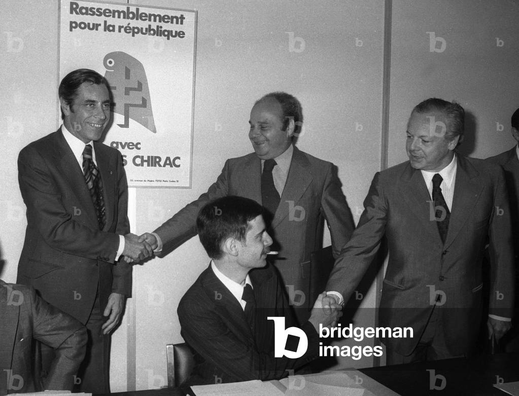 French politician Yves Guena (l) at RPR meeting, Paris, August 31, 1977 (b/w photo)