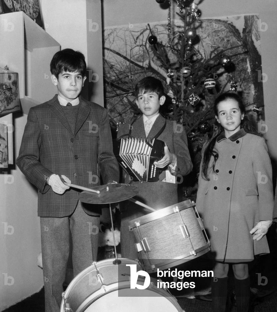 Children of Valery Giscard D'Estaing (L-R) : Louis Joachim, Henri and Jacinte Giscard D'Estaing at A Toys Exhibition on November 14, 1968 in Paris (b/w photo)