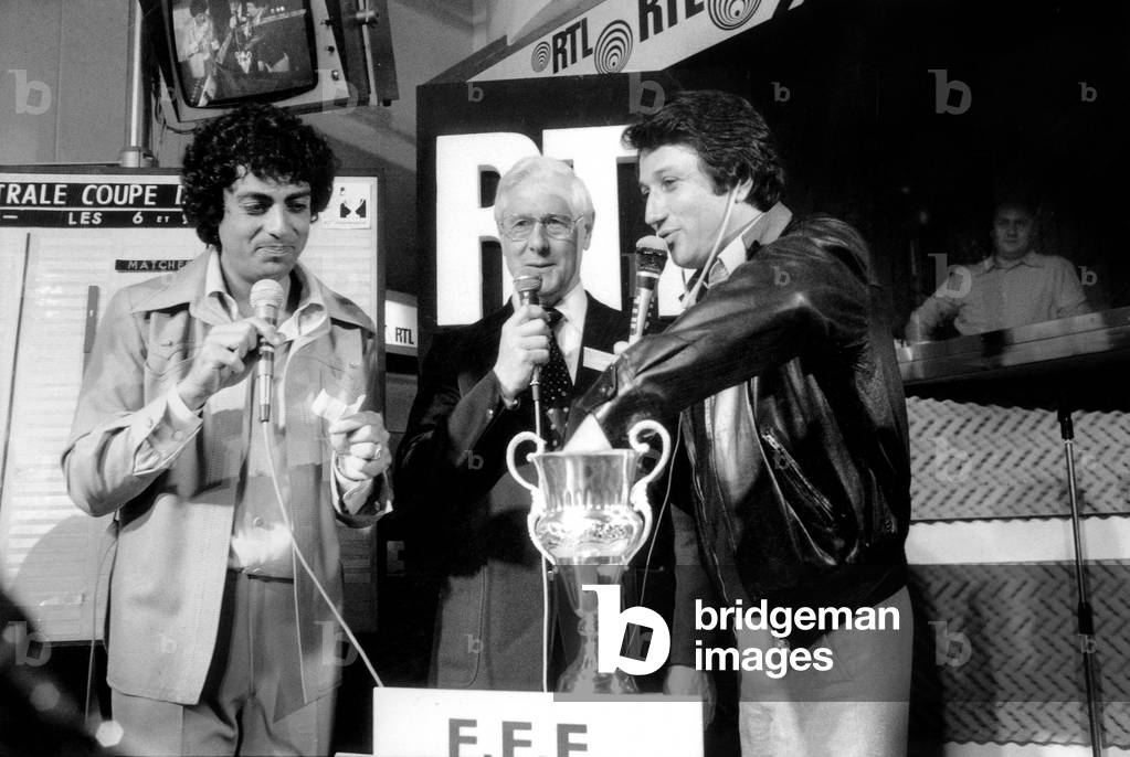 Enrico Macias, Gilbert Gauthier and Michel Drucker Drawing Finale For France Football Cup May 18, 1979 (b/w photo)