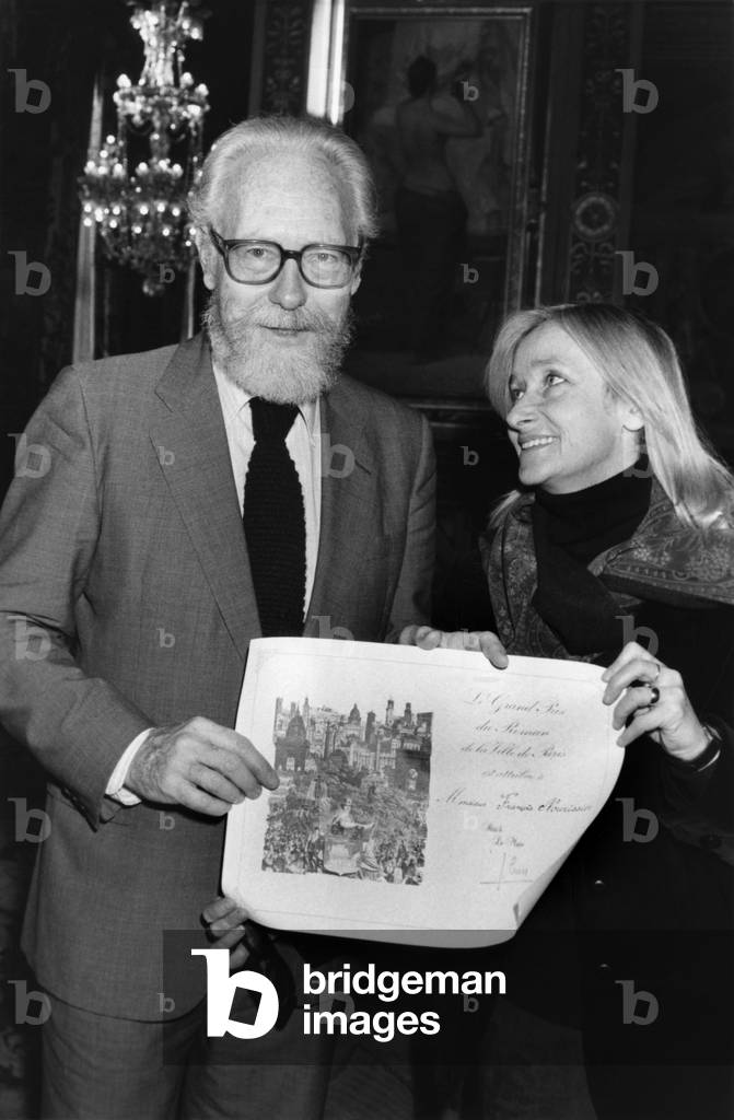 Writer Francois Nourissier has just received the Grand Prix Du Roman De La Ville De Paris. Here In The Company Of His Wife, Helene Cecile Muhlstein December 12, 1987 (b/w photo)