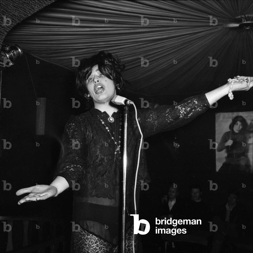 Nightclub La Garconniere in Paris on May 22, 1969 : Barman during Imitation of Mariacallas (b/w photo)
