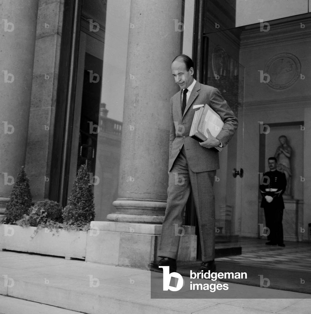 French Minister of Economy and Finance Valery Giscard d'Estaing leaving the Elysee Palace after Council of Ministers, on July 23, 1963 (b/w photo)