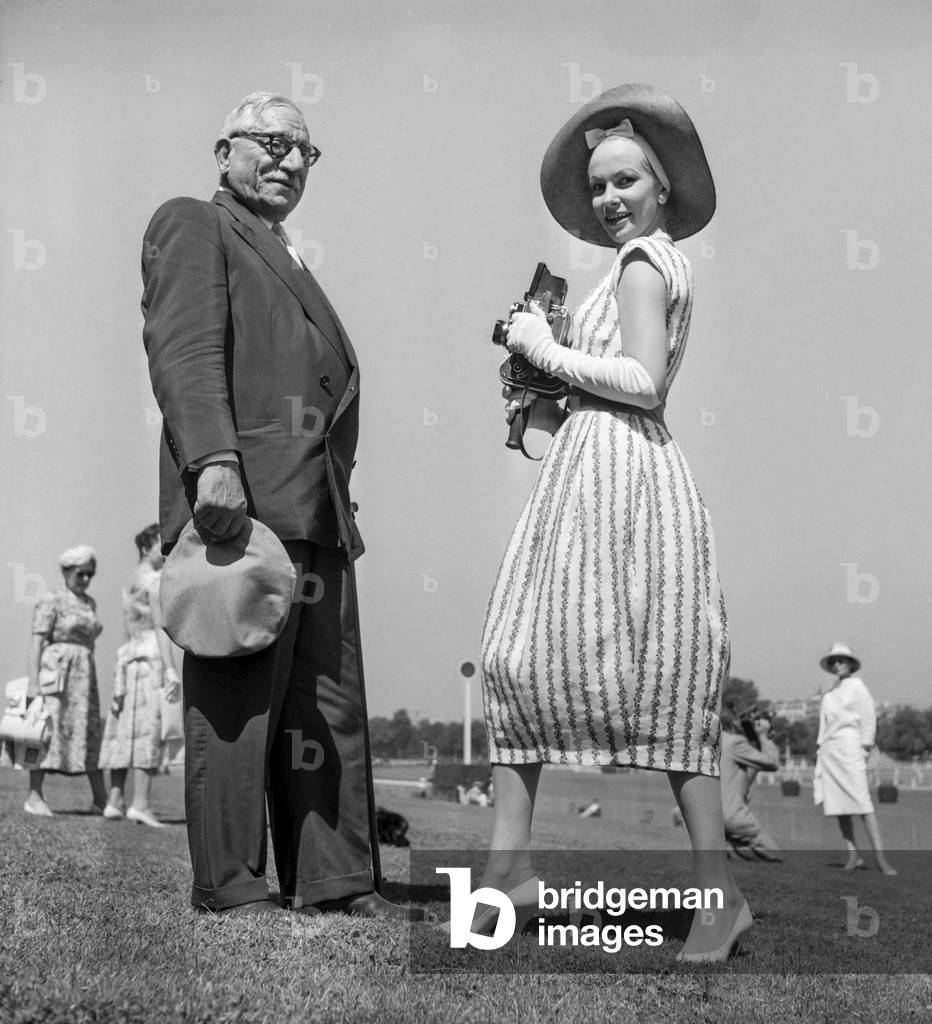 Fashionable couple at the Prix des Drags, Auteuil Hippodrome, 28 June 1957