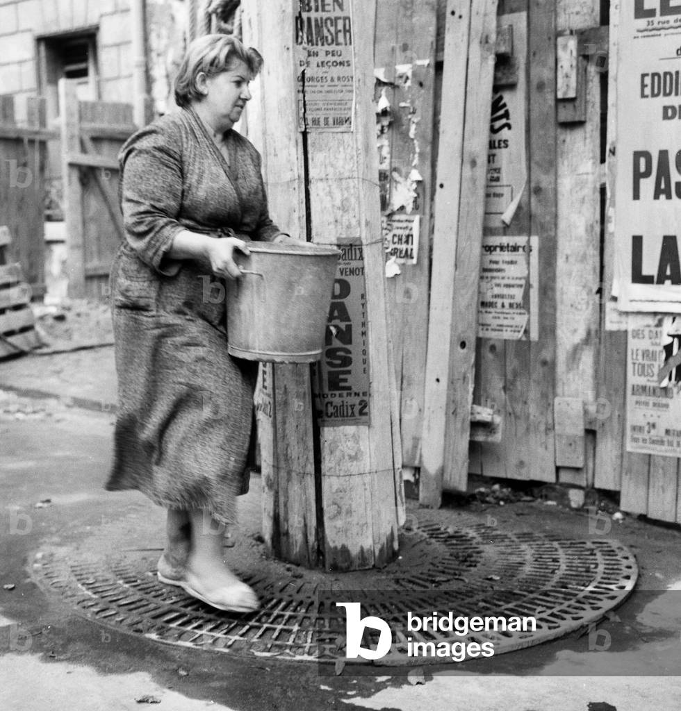 Repatriates From Algeria : Woman Living in Sphinx Building in Paris August 10, 1962 After The War in Algeria (b/w photo)