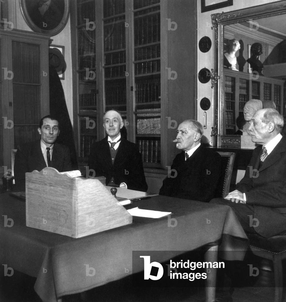 Conference About Atomic Disintegration at Sciences Academy : Frederic Joliot-Curie, The Prince of Broglie, The Duke of Broglie and Professor Langevin on November 26, 1945 (b/w photo)