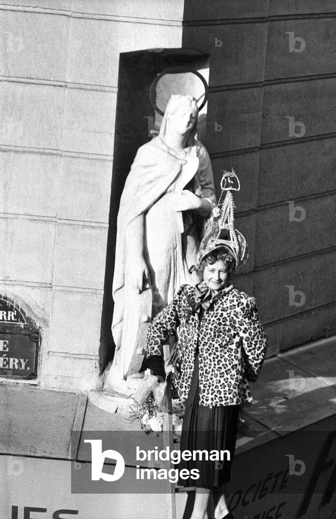 Catherinettes Putting Flowers at Statue of St Catherine in Paris, November 25, 1955 (b/w photo)