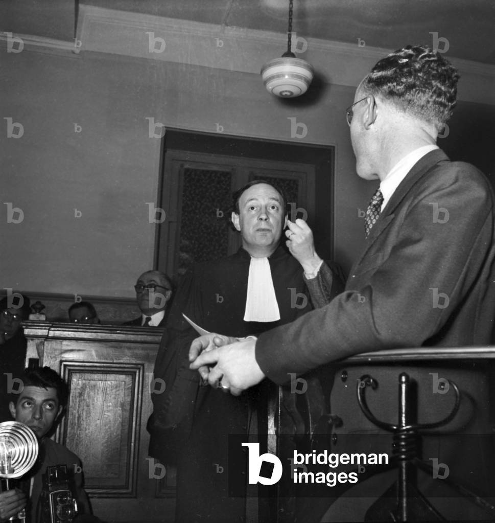 Trial of Paul Cavaillez and Dieudonne Costes (Tried For Intelligence With Hte Ennemy during Ww2) Paris, March 15, 1949 : The Lawyer Jacques Isorni and the Witness Mr Baake (b/w photo)