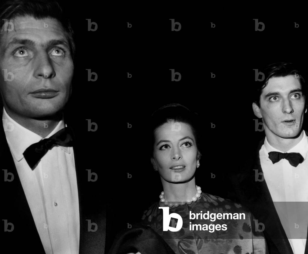 Gunther Sachs and Model Capucine at Empire Cinema in Paris For A Party December 22, 1964 (b/w photo)