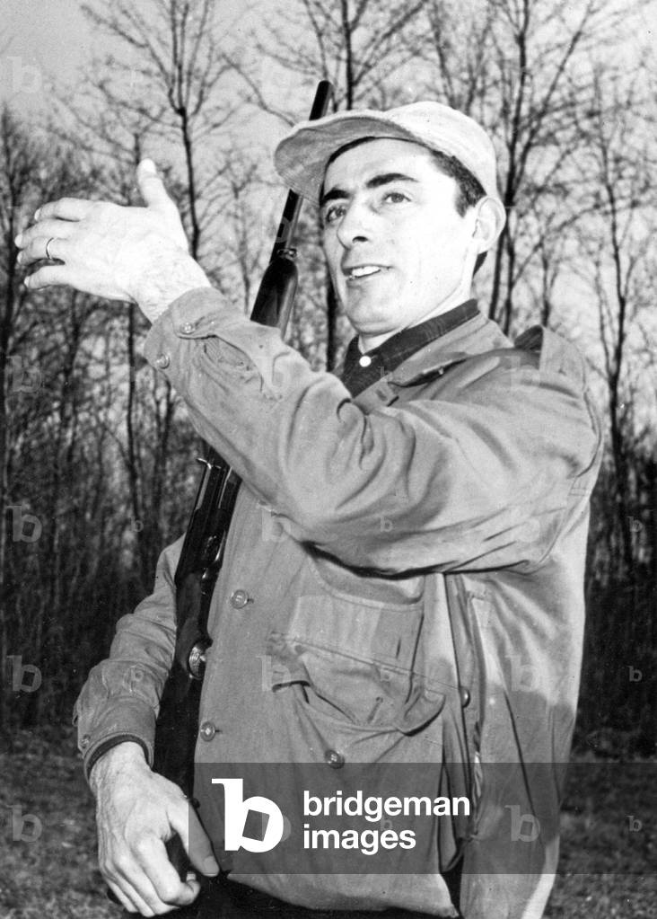 Italian Cyclist Fausto Coppi Hunting December 12, 1951 (b/w photo)