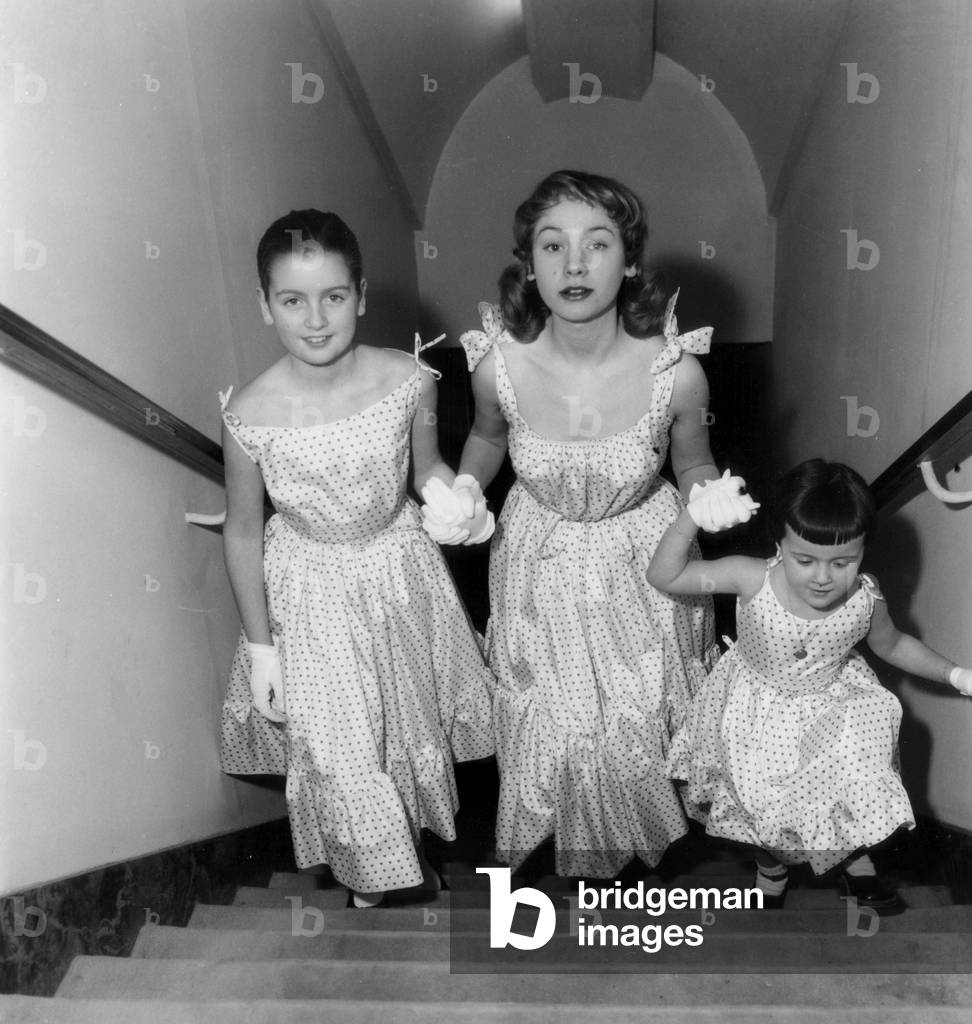 Fsahion For Children and Young Woman Spring-Summer : here Three Models For Three Ages of A Summer Dress With Print Fabric on January 31, 1954 (b/w photo)