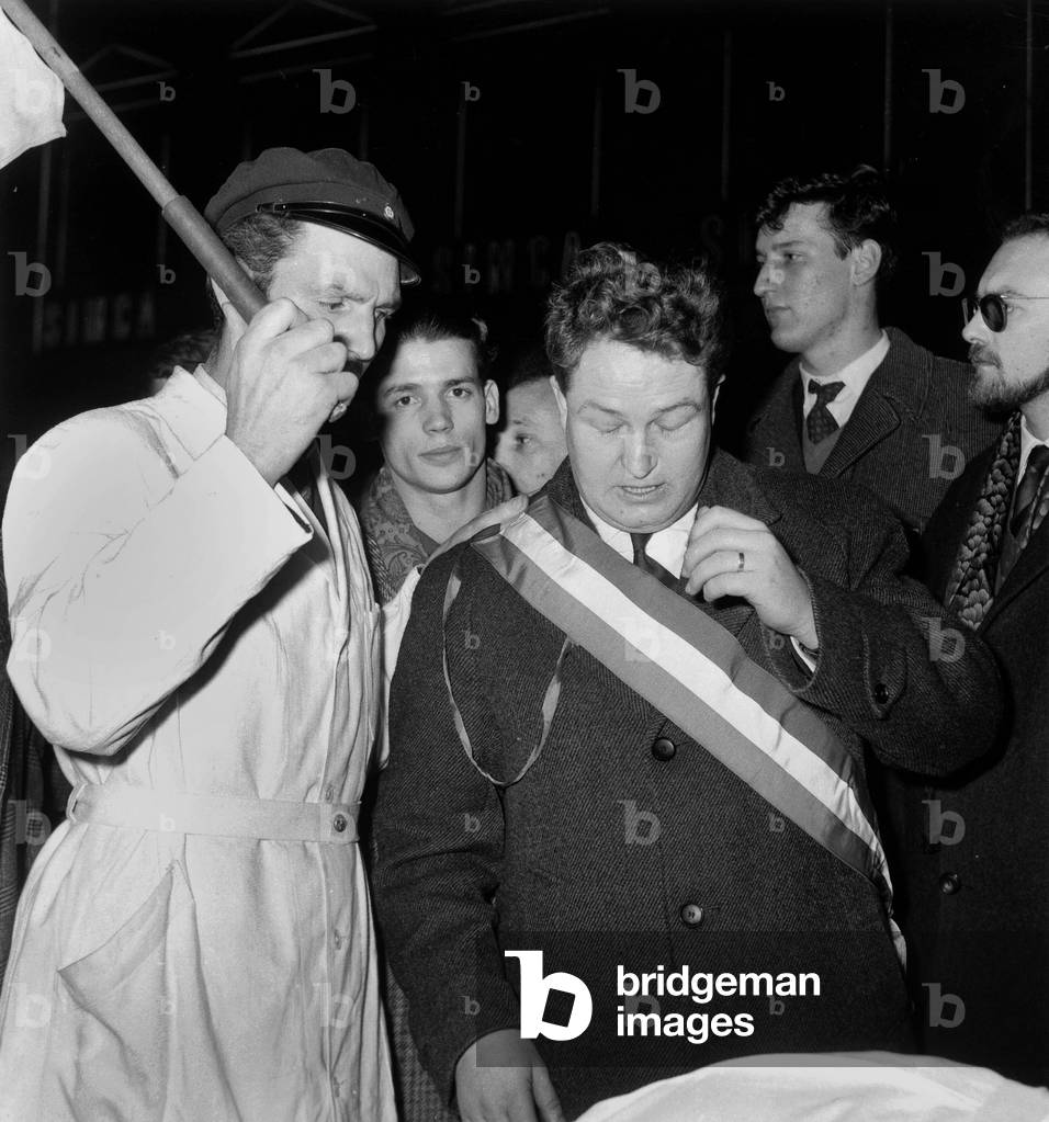 French Deputy Jean Marie Le Pen With Other Staunch Supporters of French Algeria here during Demonstrating on The Champs Elysees in Paris February 28, 1961 To Protest Against The Visit in Paris of Tunisian President Habibbourguiba (Member of The Arab League Supporting Decolonization in The World and Especially Tunisia and Morocco Support Algeria Since 1956) during War in Algeria (b/w photo)