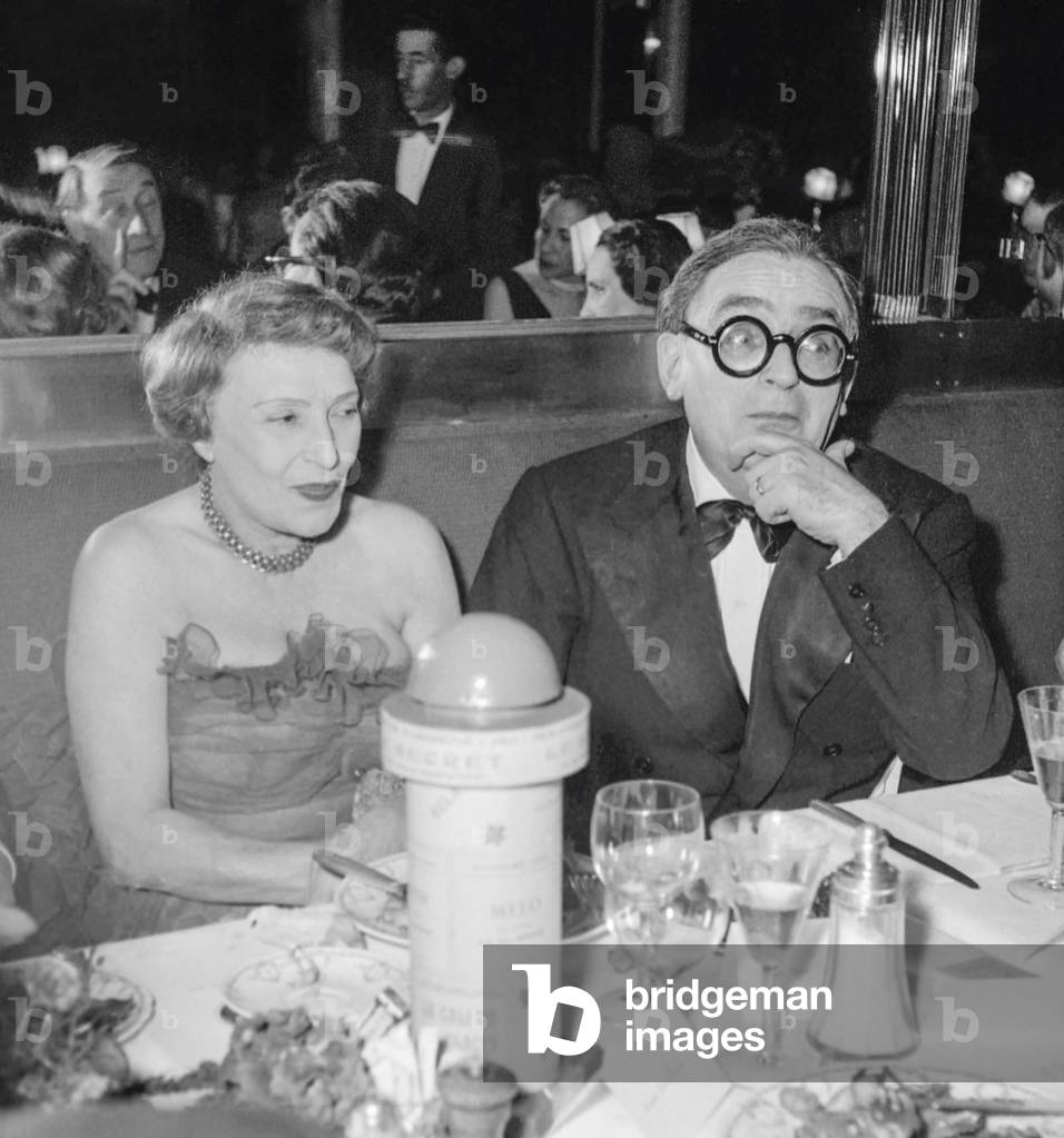Marie Ventura and Marcel Achard during the party given for HenriBernstein (he's been living in Paris for 50 years), Paris, February 2, 1951 (b/w photo)