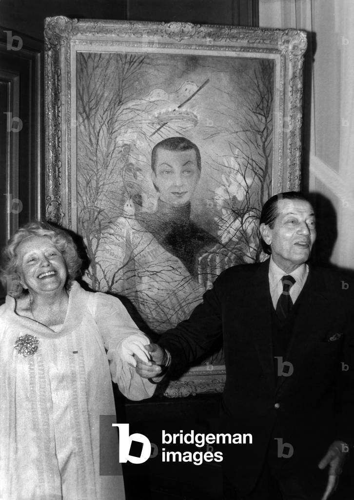 Serge Lifar And The Painter Marie Madeleine De Rasky Before The Portrait Of The Dancer And Choregrapher During The Opening Of The Exhibition Dedicated To Her Life At The Opera Library On October 18, 1977 (b/w photo)