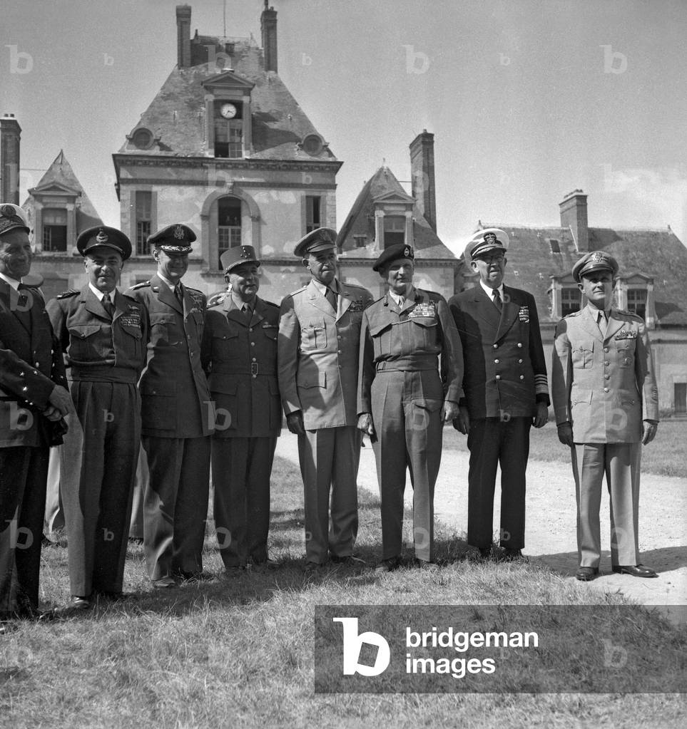 Visit of the US Chief of Staff in France : here at the Fontainebleau castle on August 5, 1949 (at time of Marshall Plan) : general Omar Bradley, Marshall Bernard Law Montgomery, Admiral Louis Emil Denfeld (b/w photo)
