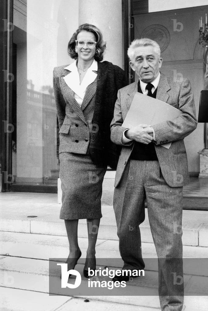 French Politicians Michele Alliot-Marie Estate Secretary in Charge of Education and Bernard Pons Minister of French Departments and French Overseas Administrative Departments and Territories here After Ministers Council at Elysee Palace December 3, 1986  (b/w photo)