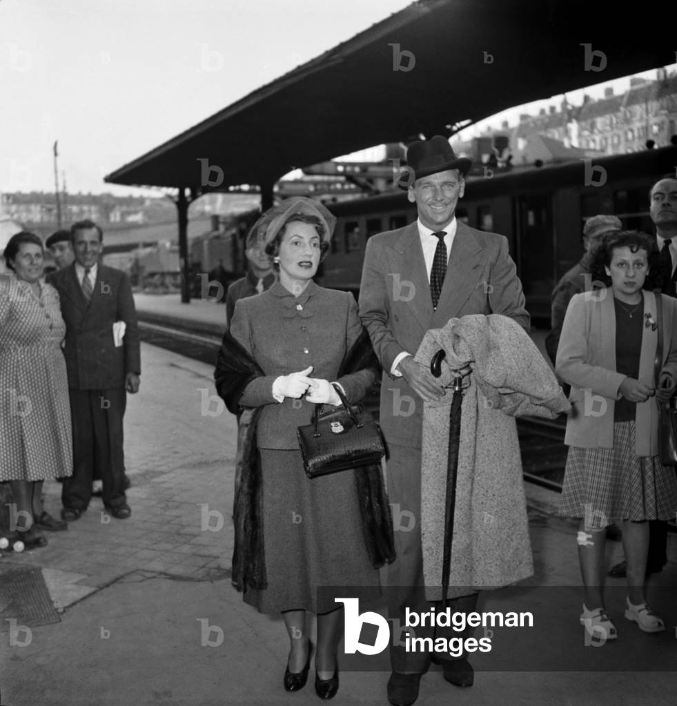 Douglas Fairbanks Jr. and his Wife Mary Lee Epling Hartford Arriving in Paris, Septmeber 8, 1948 (b/w photo)
