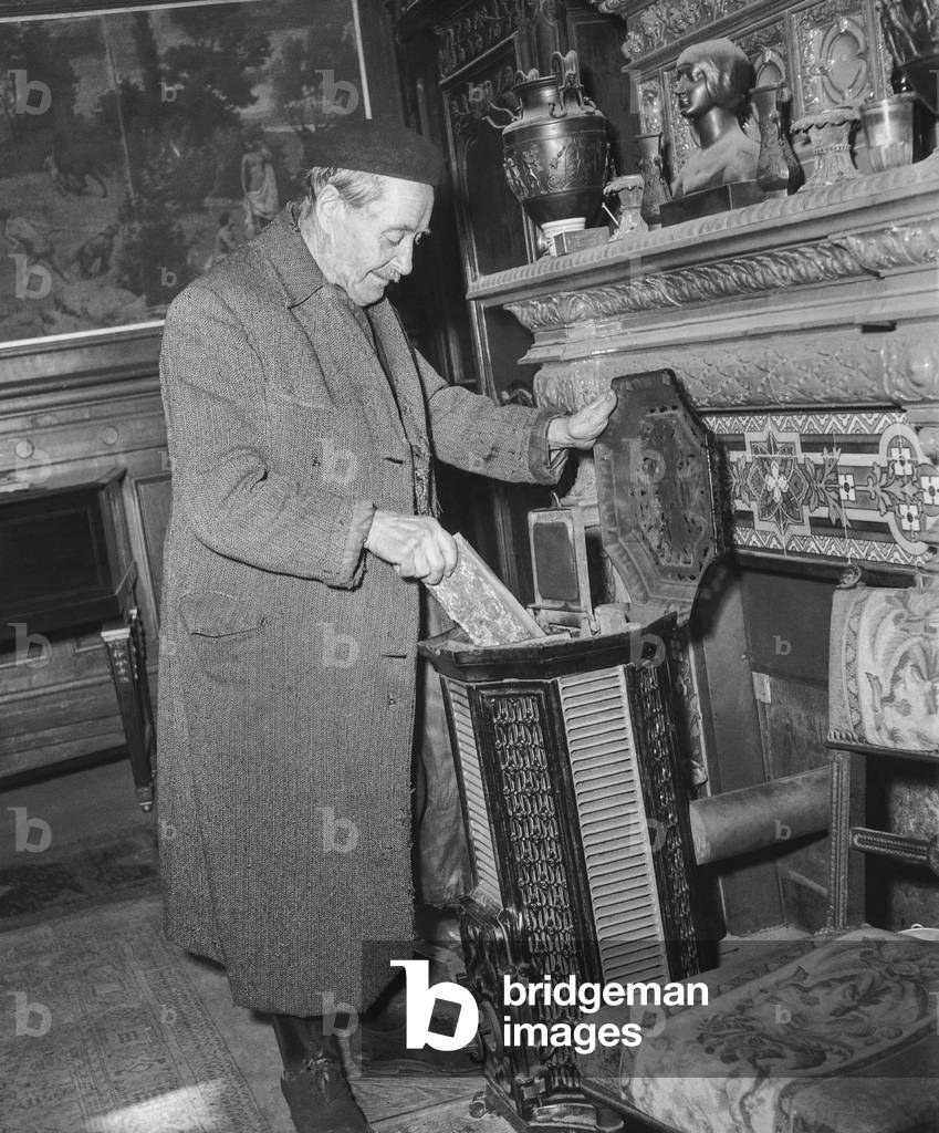 French composer Edmond Malherbe at home after he won a musical prize (