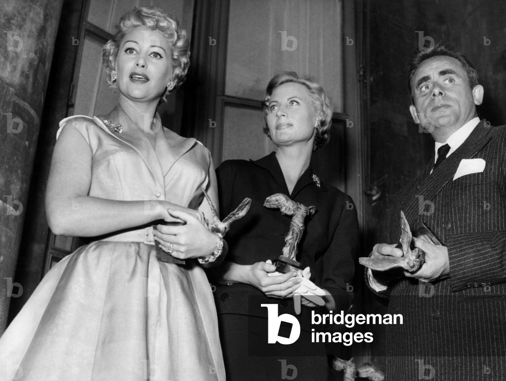 In Paris, at Prize Giving, French Actors Michel Morgan, Martine Carol and Henri-Georges Clouzot June 2, 1954 (b/w photo)