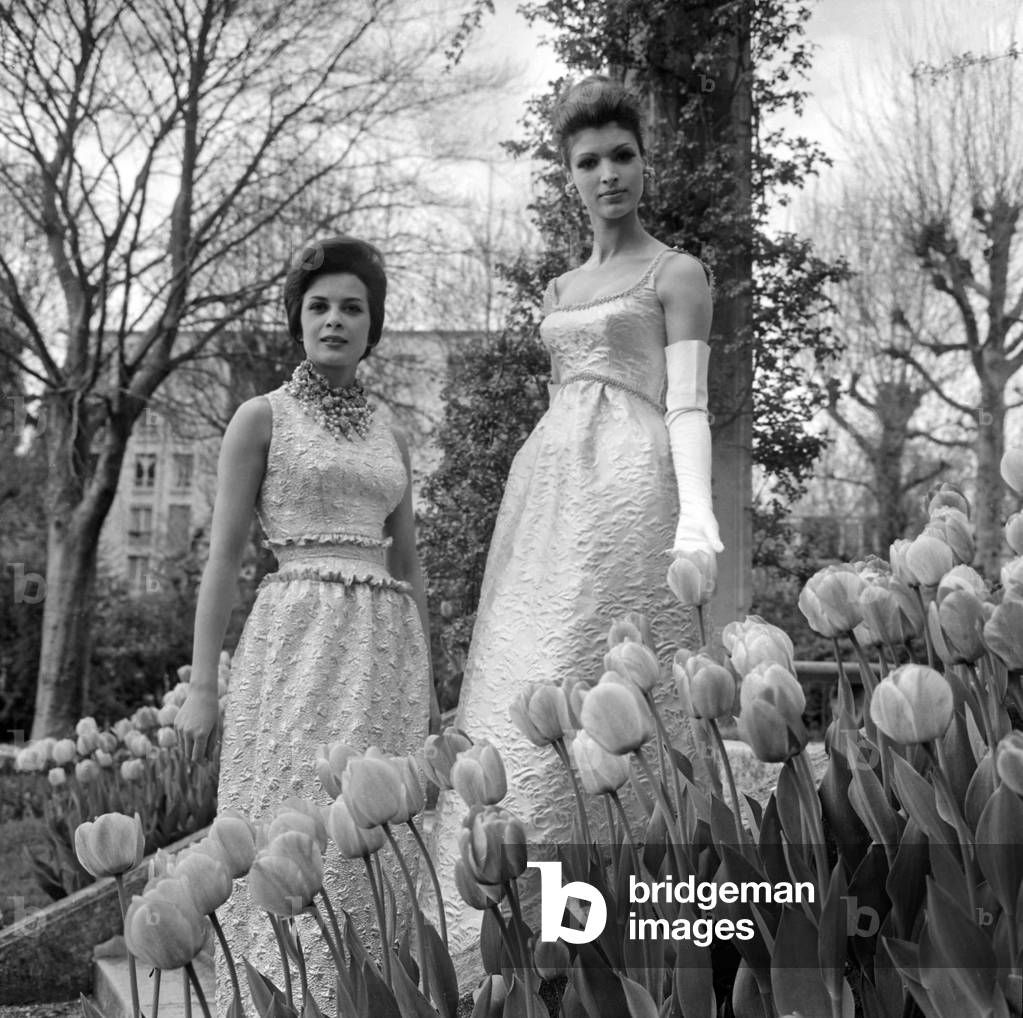 Presentation of Evening Dresses on April 30, 1963 : on L : Model By Jeanne Lanvin and on R By Jacques Heim (b/w photo)