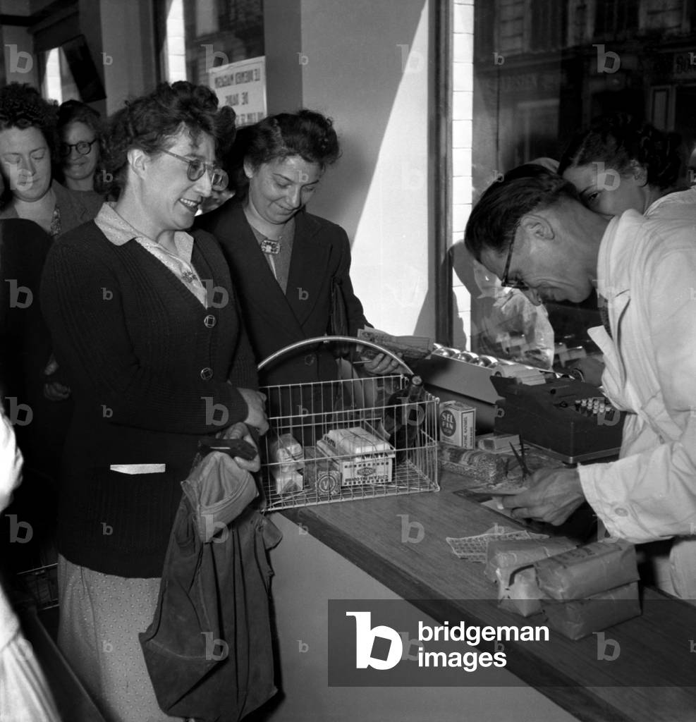 Irst Supermarket Goulet Turpin in Paris July 5, 1948 : Self-Service Store, at The Checkout, The Man Is Cutting The Ration Coupons (b/w photo)