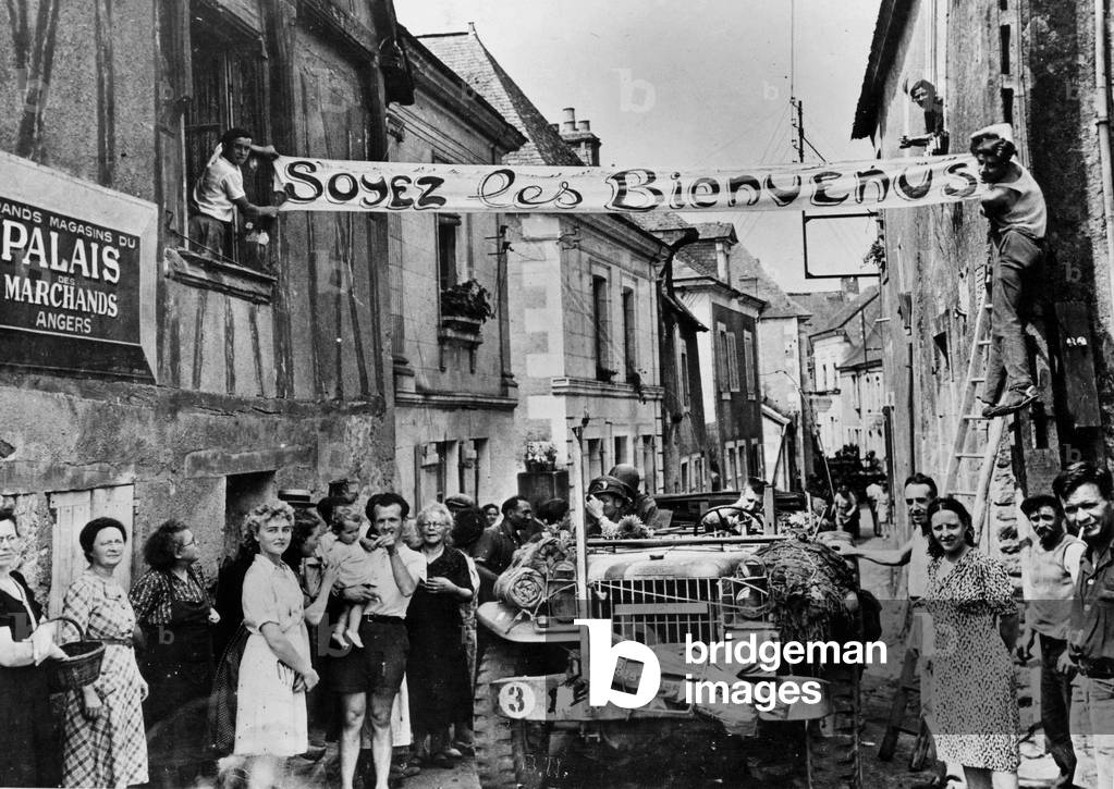 French in Jubilation Accomodates The American Soldiers during The Release of The Town of Angers, August 12, 1944  (b/w photo)
