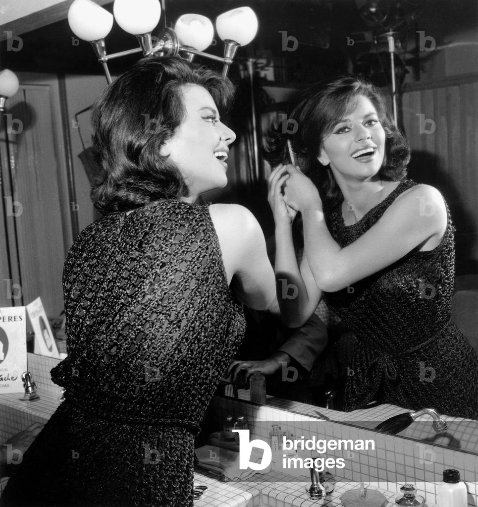 Actress Giovanna Ralli Combing her Hair on Set of Film A Date To Kill July 31, 1961 (b/w photo)