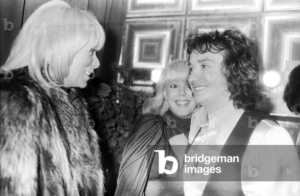 Mireille Darc congratulating Michel Sardou after his concert at the Olympia, Paris, December 31, 1974 (b/w photo)