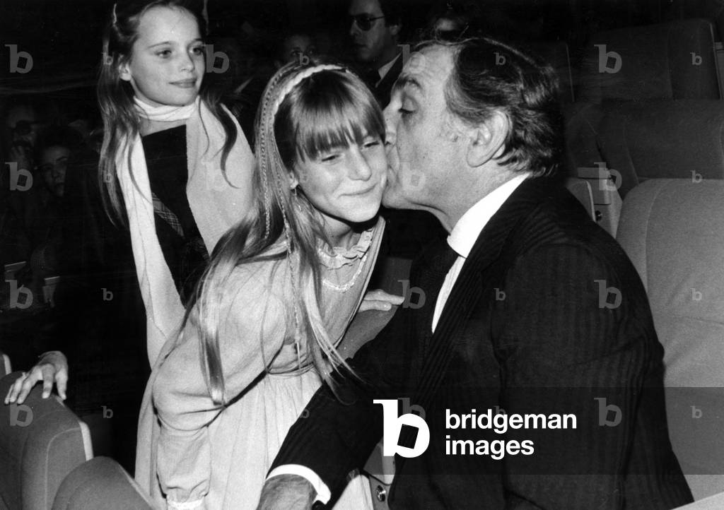 Lino Ventura Kissing Young Actress Valentine Bordelet (Starring Cosette When Child) here at Premiere of Film Les Miserables in Paris October 19, 1982 (b/w photo)