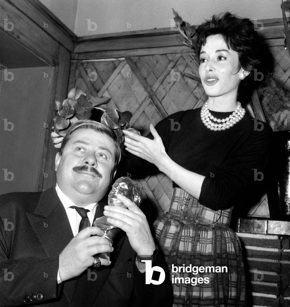 Pascale Audret Giving To Actor Francis Blanche The Film Humor Prize December 14, 1954 (b/w photo)