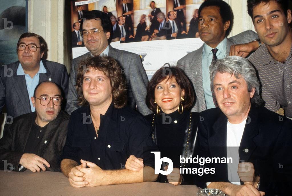 Patrick Sebastien Launches Operation White Button Against Drugs at Press Conference Top From Left to Right: Henry Tisot, X, Greg Germain, X, Bottom From Left to Right: Guy Montagne, Patrick Sebastien, Denise Fabre, Jean-Marc Cerrone October 24, 1989 (photo)