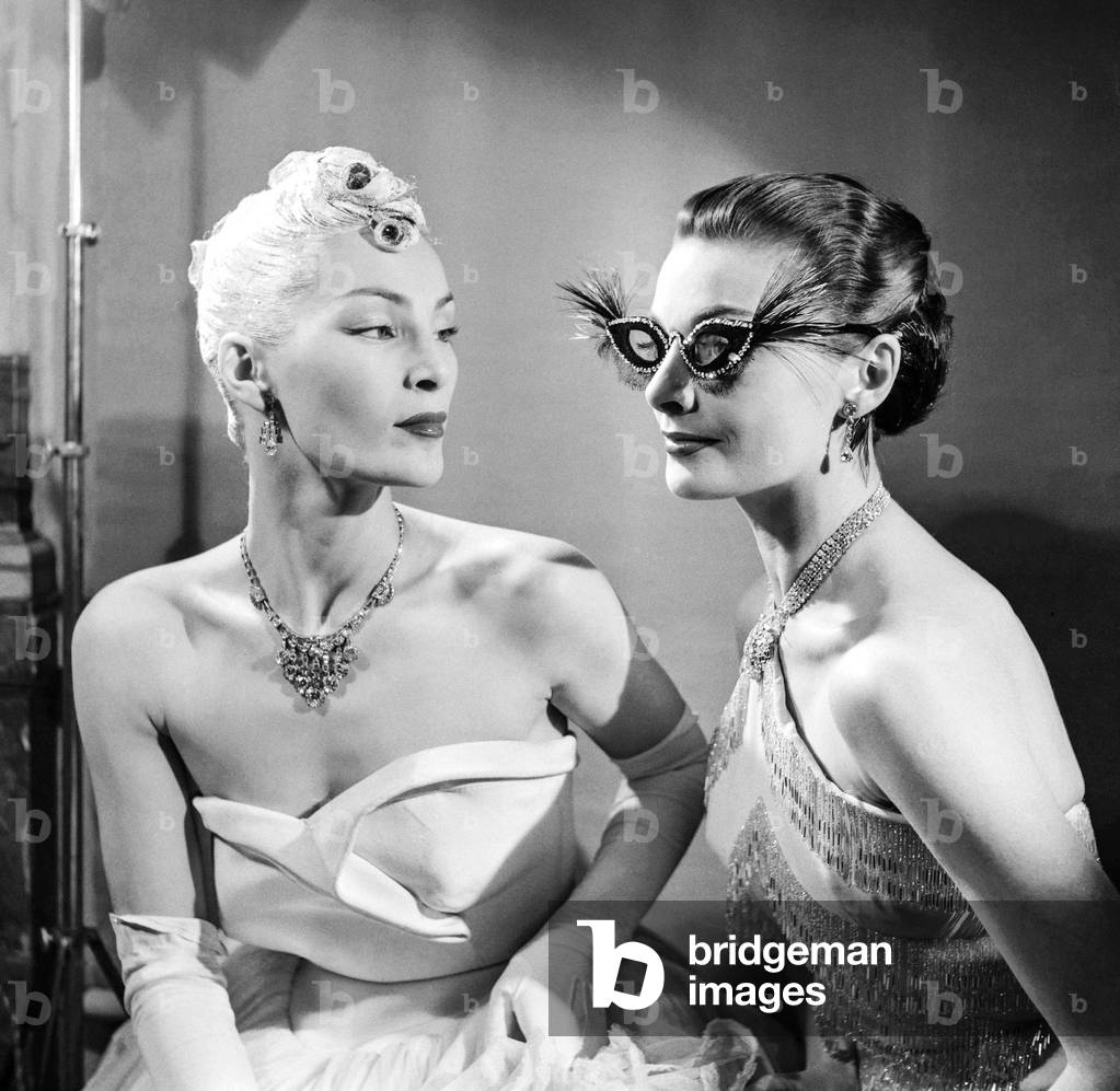 Hairstyle by French hairdresser Antoine and evening glasses by Pierre and Rene, Paris, January 31, 1951 (b/w photo)
