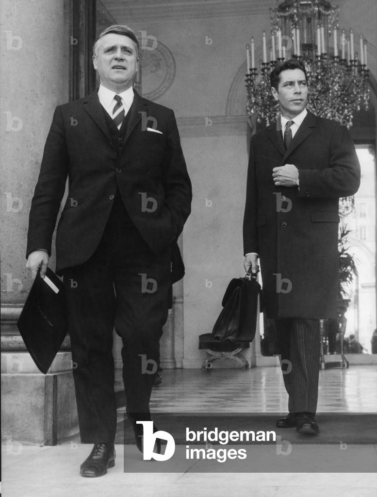 Robert Boulin and Yves Guena Leaving Elysee Palace in Paris After Council of Ministers on March 19, 1969 (b/w photo)