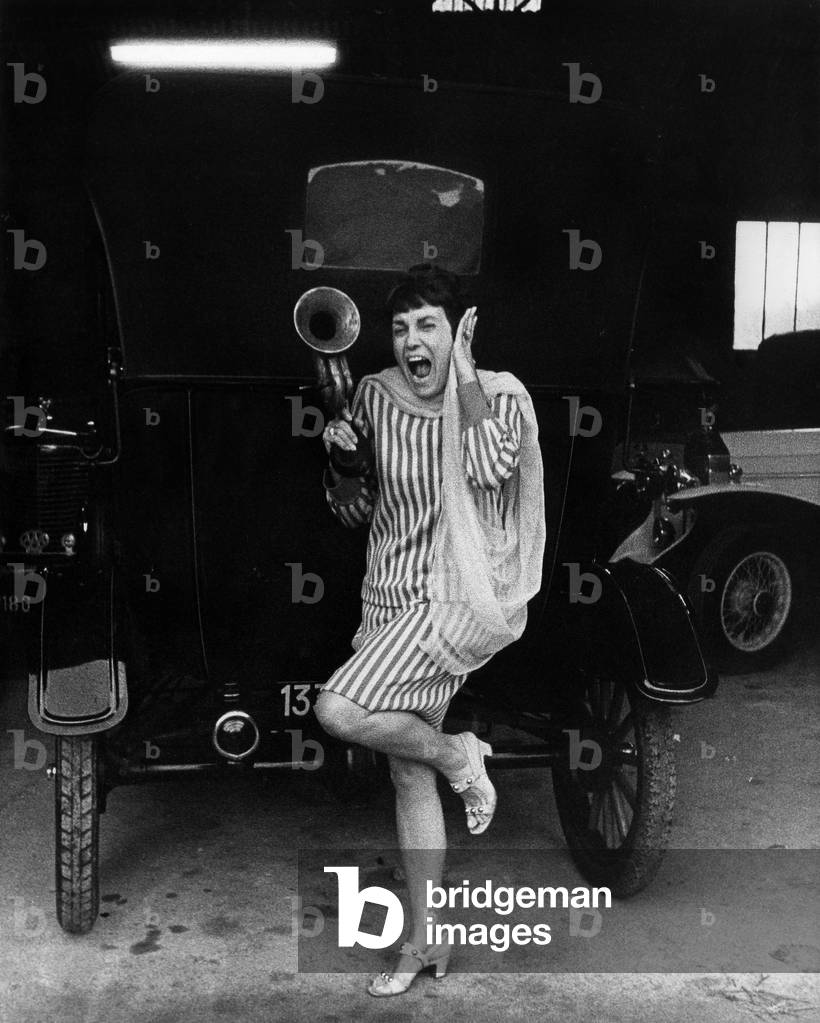 Georgette Plana Appuyee Against A Car Rolls Style 1925 In March 1969 (b/w photo)