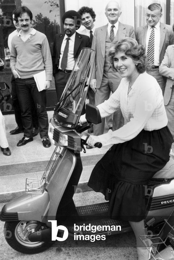 Edith Cresson, French Minister of Foreign Trade, on The New Peugeot Scooter on June 1St, 1983 Outside her Ministry (b/w photo)