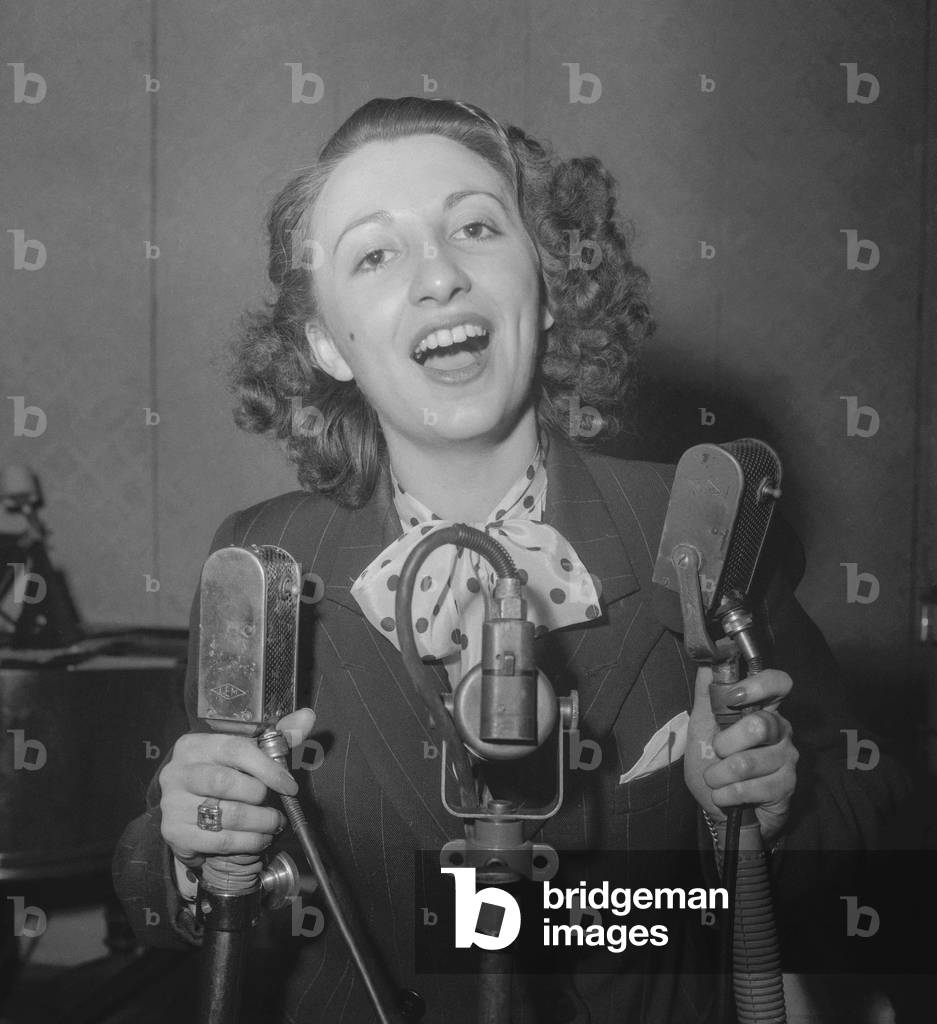 Liliane Dumont, young French milliner, has won the milliners song contest, Paris, April 15, 1950 (b/w photo)