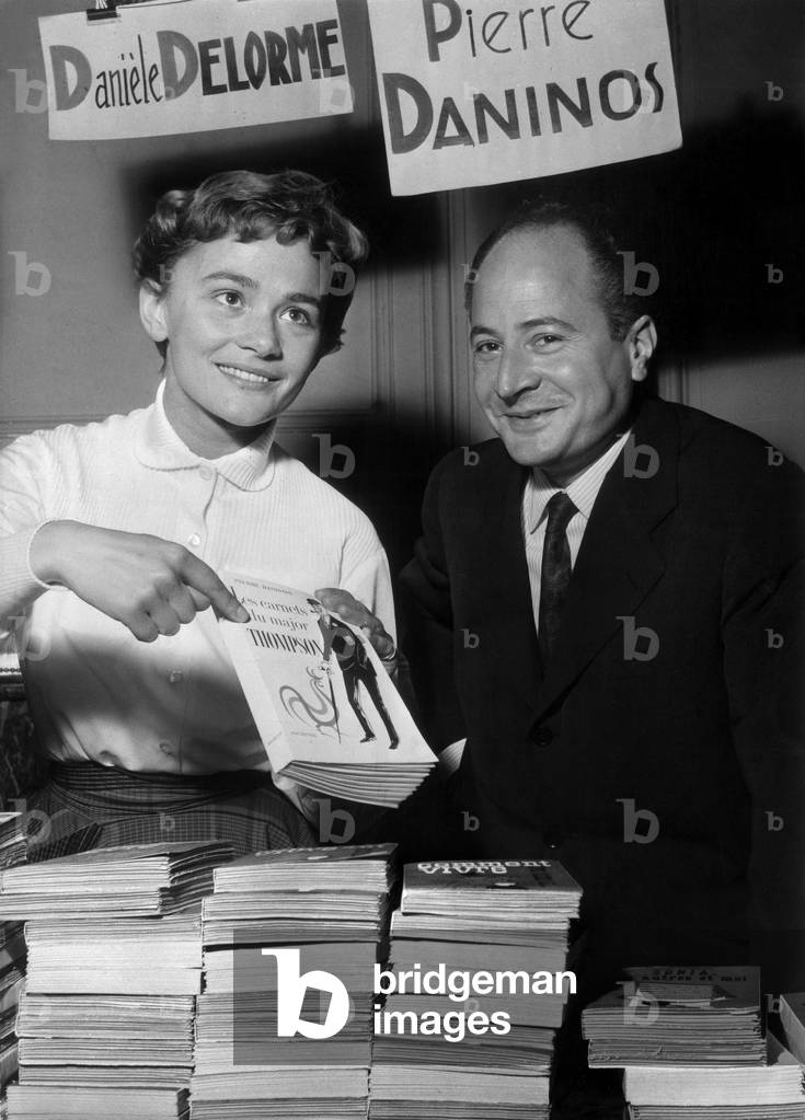 Books Sale of Veteran Writers : French Writer Pierre Daninos and Actress Daniele Delorme June 3, 1955 (b/w photo)