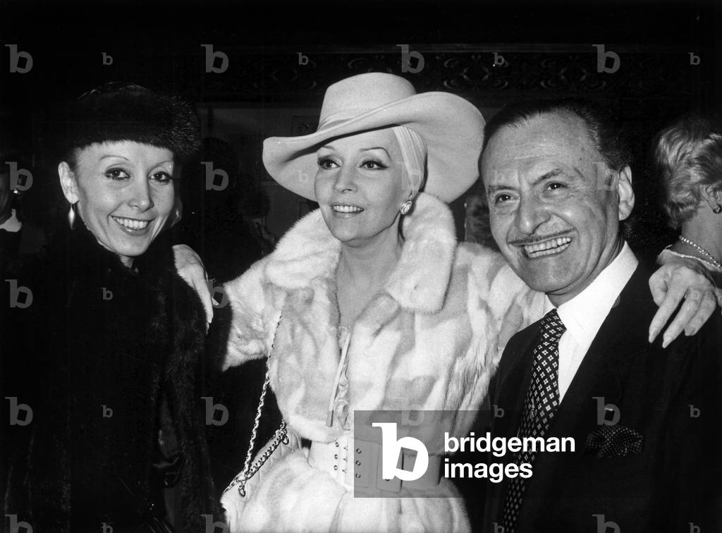 Nicky Nancel (L) and Ludmilla Tcherina Congratulating Hairdresser Alexandre De Paris Who Has Received French Award For Distinguished Services in A Public Or Private Capacity, at Paris Town Hall December 3, 1984 (b/w photo)