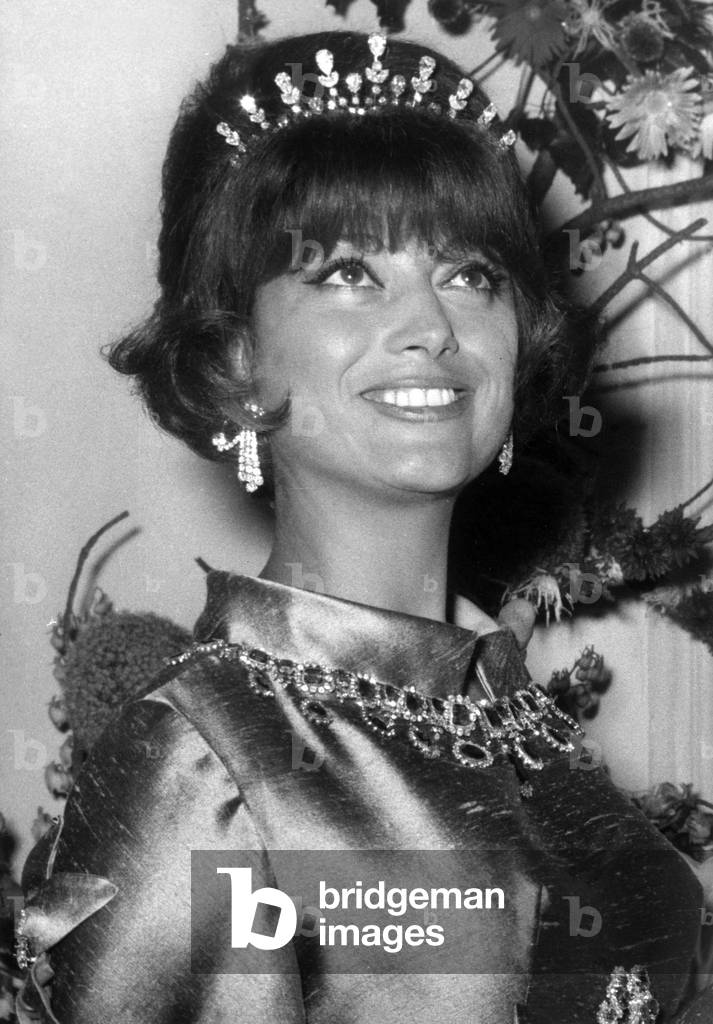 French Actress Marie-Helene Arnaud With Dress By Michel Telbin With Diamonds and Emeralds, July 30, 1965 (b/w photo)