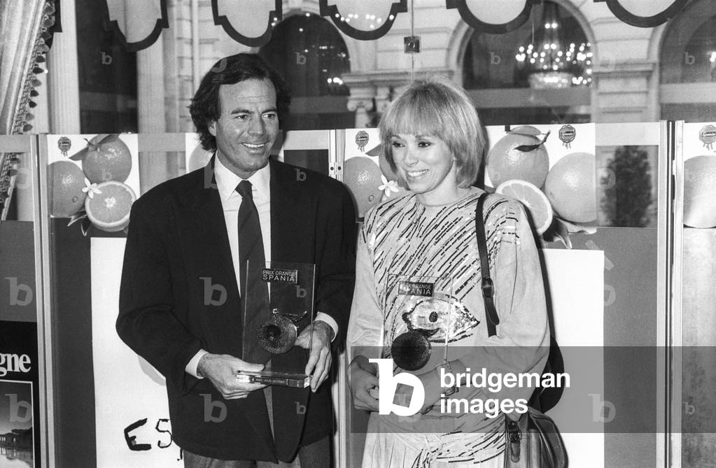 Julio Iglesias and Mireille Darc after they received the 